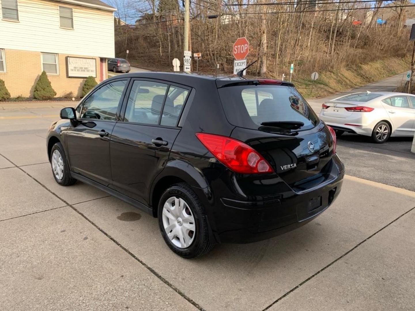 2011 BLACK NISSAN VERSA S (3N1BC1CP0BL) with an 1.8L engine, Automatic transmission, located at 503 First Street, Canonsburg, PA, 15317, (724) 745-0566, 40.266006, -80.178413 - Photo#2