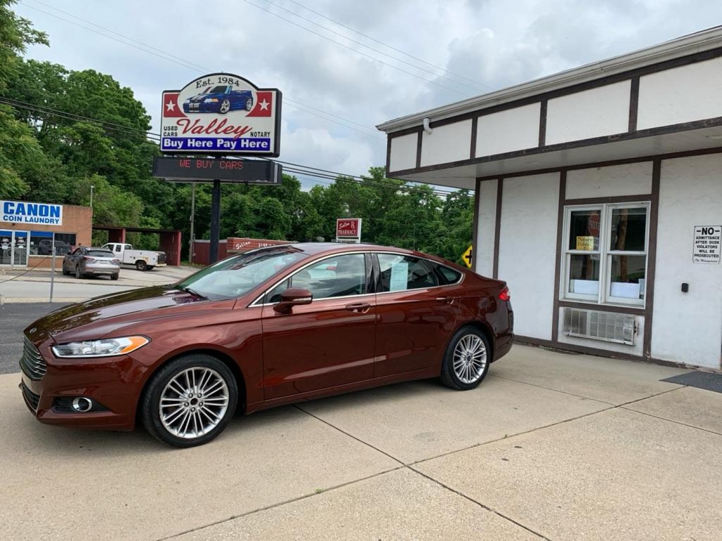 2015 MAROON FORD FUSION SE (3FA6P0T99FR) with an 2.0L engine, Automatic transmission, located at 503 First Street, Canonsburg, PA, 15317, (724) 745-0566, 40.266006, -80.178413 - Photo#0