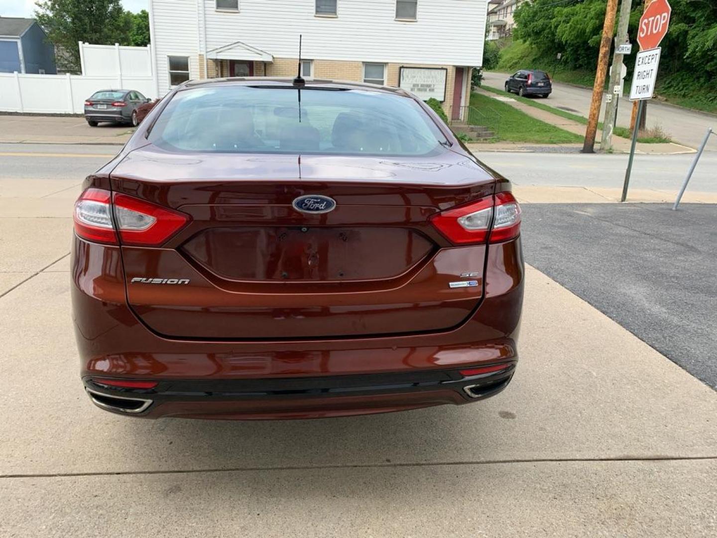 2015 MAROON FORD FUSION SE (3FA6P0T99FR) with an 2.0L engine, Automatic transmission, located at 503 First Street, Canonsburg, PA, 15317, (724) 745-0566, 40.266006, -80.178413 - Photo#3