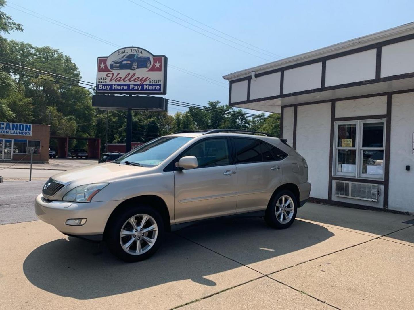 2008 GOLD LEXUS RX 350 (2T2HK31U58C) with an 3.5L engine, Automatic transmission, located at 503 First Street, Canonsburg, PA, 15317, (724) 745-0566, 40.266006, -80.178413 - THIS VEHICLE IS BEING SOLD UNDER CONSIGNMENT! CAR FAX AVAILABLE! NAVIGATION, BACK UP CAMERA, SUNROOF, AM/FM/SAT/TAPE/6 DISC CD CHANGER WITH TOUCH SCREEN DISPLAY, SUNROOF, HEATED SEATS WITH MEMORY, HANDS FREE VOICE ACTIVATION, RADIO CONTROLS ON STEERING WHEEL, UNIVERSAL GARAGE DOOR OPENER, CRUISE - Photo#0