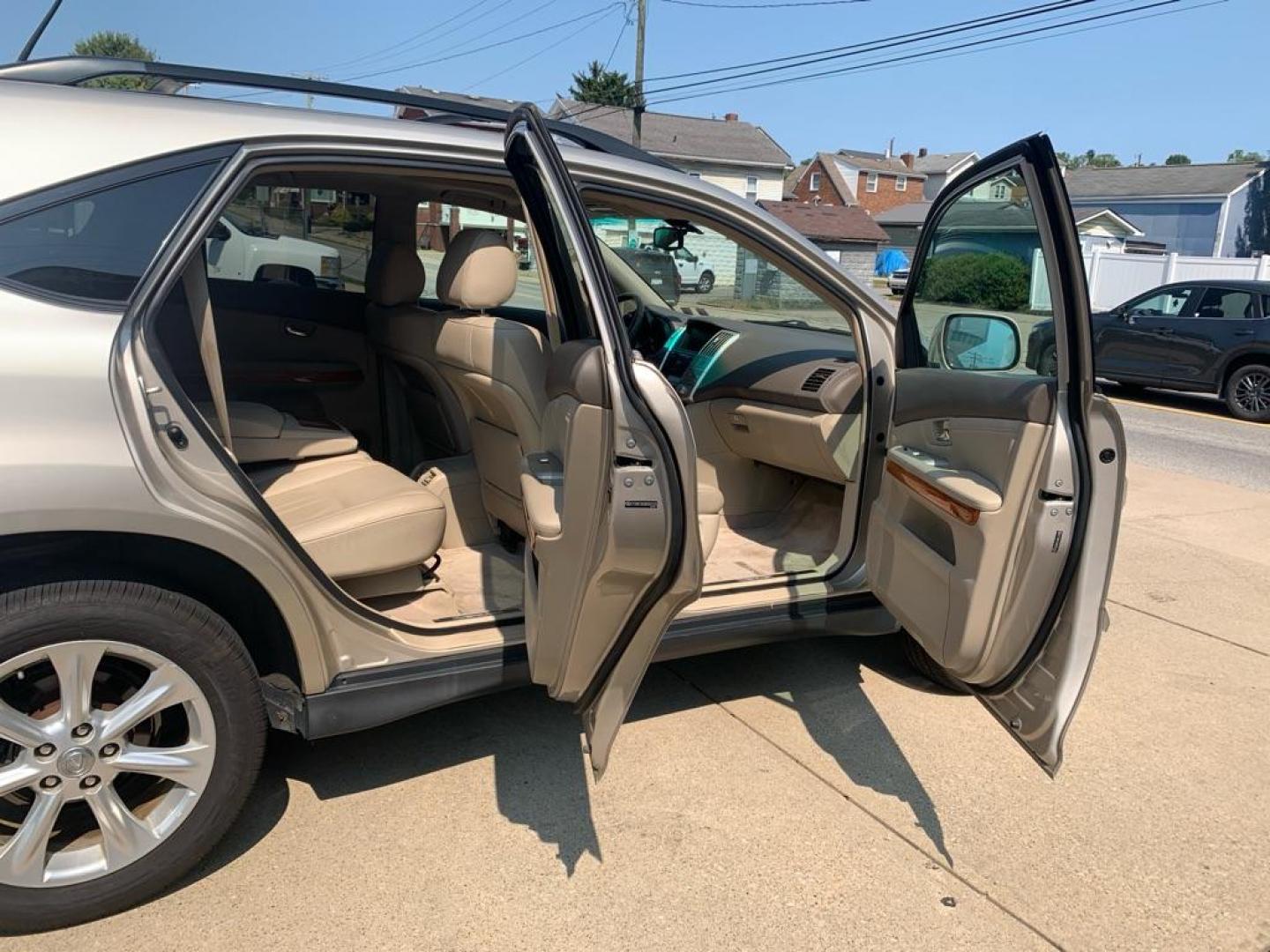 2008 GOLD LEXUS RX 350 (2T2HK31U58C) with an 3.5L engine, Automatic transmission, located at 503 First Street, Canonsburg, PA, 15317, (724) 745-0566, 40.266006, -80.178413 - THIS VEHICLE IS BEING SOLD UNDER CONSIGNMENT! CAR FAX AVAILABLE! NAVIGATION, BACK UP CAMERA, SUNROOF, AM/FM/SAT/TAPE/6 DISC CD CHANGER WITH TOUCH SCREEN DISPLAY, SUNROOF, HEATED SEATS WITH MEMORY, HANDS FREE VOICE ACTIVATION, RADIO CONTROLS ON STEERING WHEEL, UNIVERSAL GARAGE DOOR OPENER, CRUISE - Photo#12