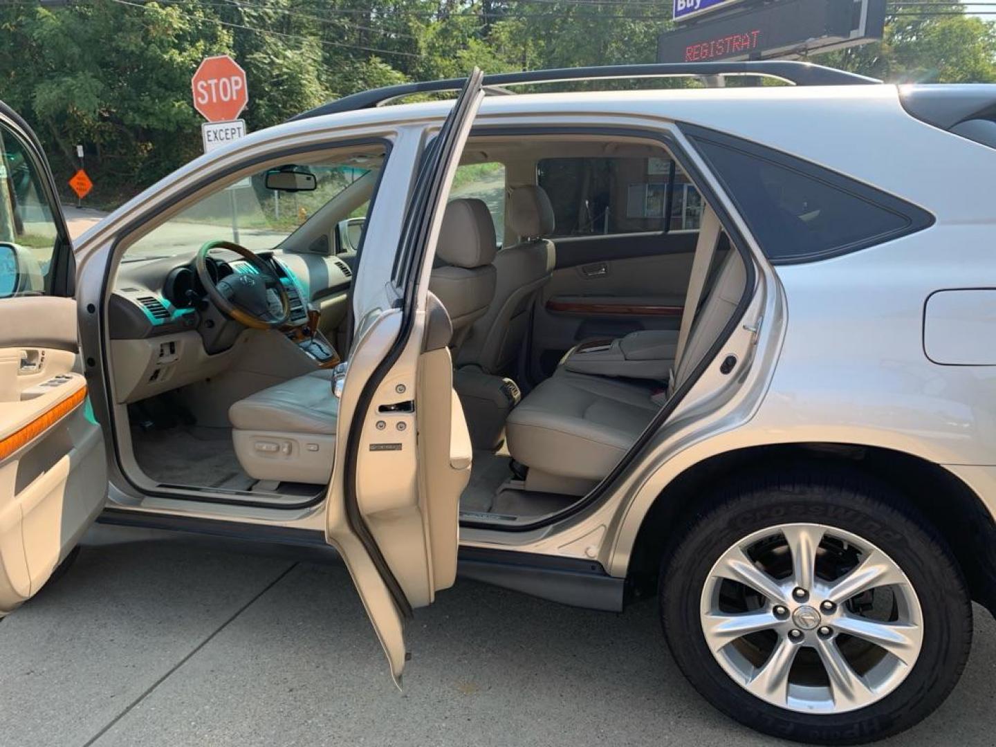 2008 GOLD LEXUS RX 350 (2T2HK31U58C) with an 3.5L engine, Automatic transmission, located at 503 First Street, Canonsburg, PA, 15317, (724) 745-0566, 40.266006, -80.178413 - THIS VEHICLE IS BEING SOLD UNDER CONSIGNMENT! CAR FAX AVAILABLE! NAVIGATION, BACK UP CAMERA, SUNROOF, AM/FM/SAT/TAPE/6 DISC CD CHANGER WITH TOUCH SCREEN DISPLAY, SUNROOF, HEATED SEATS WITH MEMORY, HANDS FREE VOICE ACTIVATION, RADIO CONTROLS ON STEERING WHEEL, UNIVERSAL GARAGE DOOR OPENER, CRUISE - Photo#13