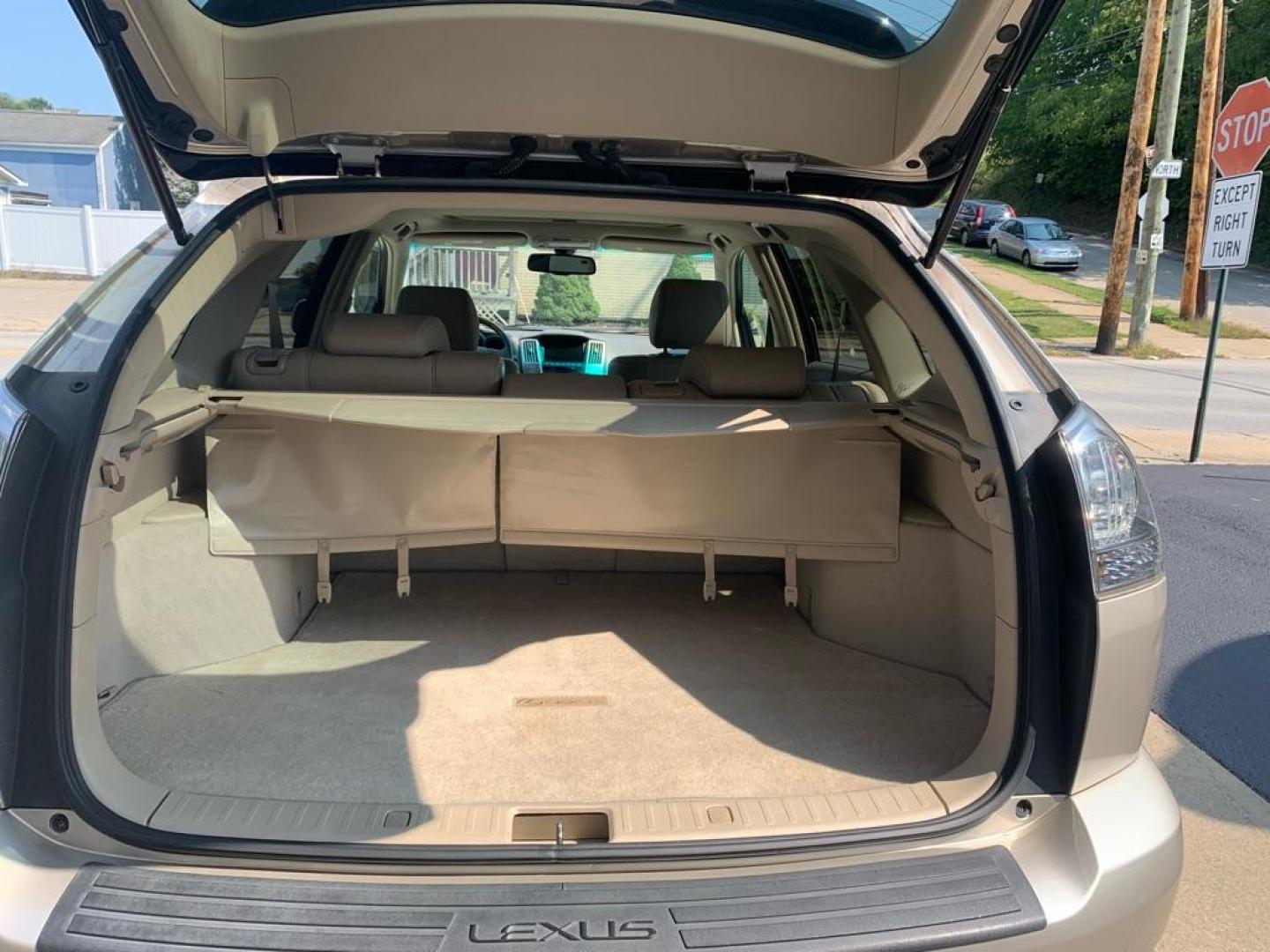 2008 GOLD LEXUS RX 350 (2T2HK31U58C) with an 3.5L engine, Automatic transmission, located at 503 First Street, Canonsburg, PA, 15317, (724) 745-0566, 40.266006, -80.178413 - THIS VEHICLE IS BEING SOLD UNDER CONSIGNMENT! CAR FAX AVAILABLE! NAVIGATION, BACK UP CAMERA, SUNROOF, AM/FM/SAT/TAPE/6 DISC CD CHANGER WITH TOUCH SCREEN DISPLAY, SUNROOF, HEATED SEATS WITH MEMORY, HANDS FREE VOICE ACTIVATION, RADIO CONTROLS ON STEERING WHEEL, UNIVERSAL GARAGE DOOR OPENER, CRUISE - Photo#14