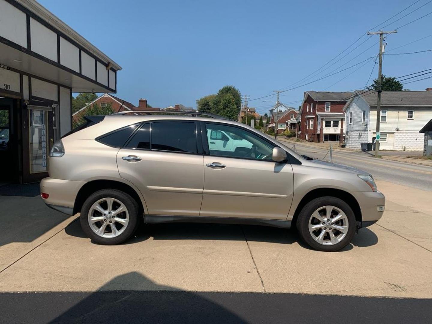 2008 GOLD LEXUS RX 350 (2T2HK31U58C) with an 3.5L engine, Automatic transmission, located at 503 First Street, Canonsburg, PA, 15317, (724) 745-0566, 40.266006, -80.178413 - THIS VEHICLE IS BEING SOLD UNDER CONSIGNMENT! CAR FAX AVAILABLE! NAVIGATION, BACK UP CAMERA, SUNROOF, AM/FM/SAT/TAPE/6 DISC CD CHANGER WITH TOUCH SCREEN DISPLAY, SUNROOF, HEATED SEATS WITH MEMORY, HANDS FREE VOICE ACTIVATION, RADIO CONTROLS ON STEERING WHEEL, UNIVERSAL GARAGE DOOR OPENER, CRUISE - Photo#5