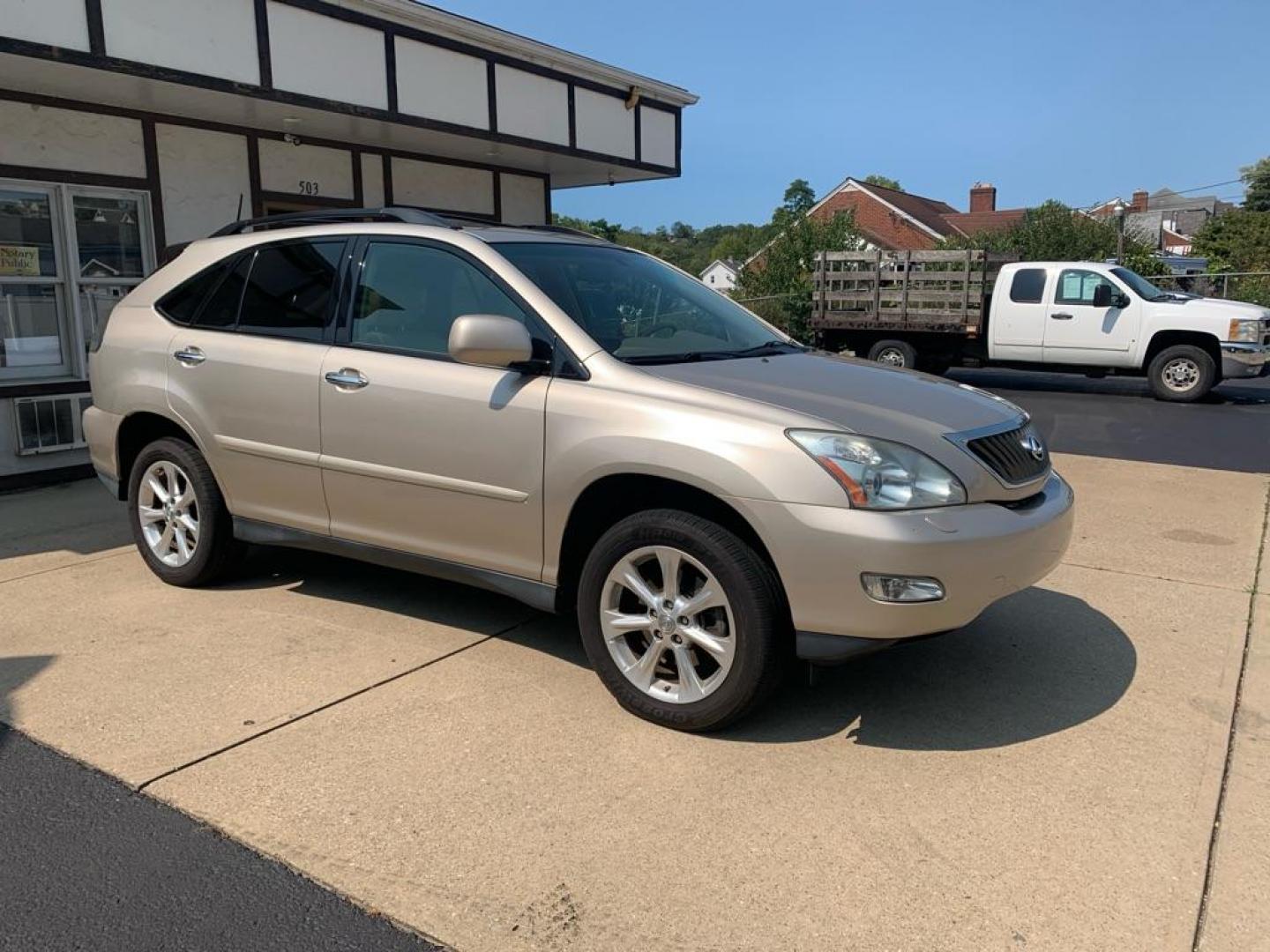 2008 GOLD LEXUS RX 350 (2T2HK31U58C) with an 3.5L engine, Automatic transmission, located at 503 First Street, Canonsburg, PA, 15317, (724) 745-0566, 40.266006, -80.178413 - THIS VEHICLE IS BEING SOLD UNDER CONSIGNMENT! CAR FAX AVAILABLE! NAVIGATION, BACK UP CAMERA, SUNROOF, AM/FM/SAT/TAPE/6 DISC CD CHANGER WITH TOUCH SCREEN DISPLAY, SUNROOF, HEATED SEATS WITH MEMORY, HANDS FREE VOICE ACTIVATION, RADIO CONTROLS ON STEERING WHEEL, UNIVERSAL GARAGE DOOR OPENER, CRUISE - Photo#6