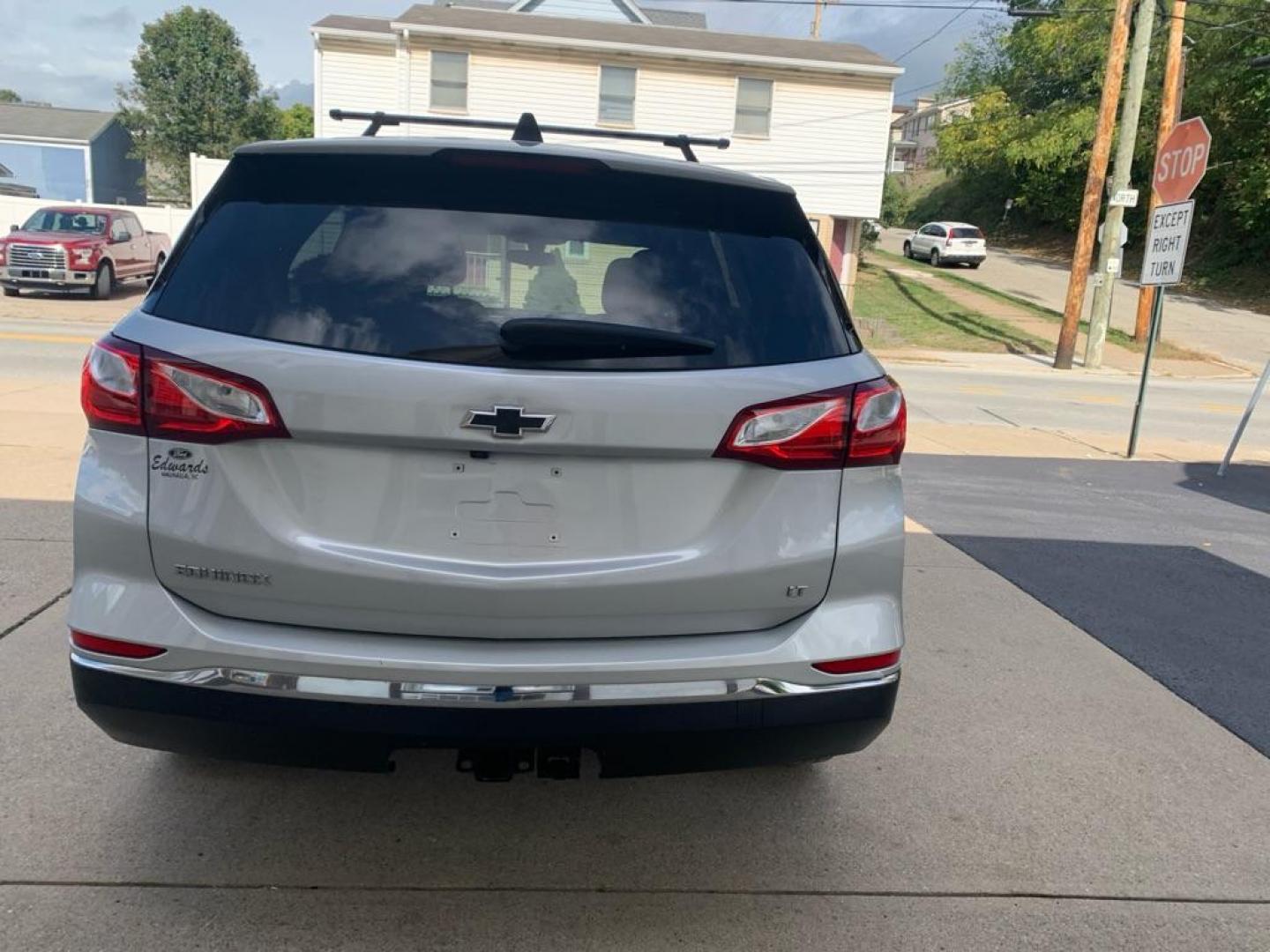 2018 SILVER CHEVROLET EQUINOX LT (2GNAXJEV4J6) with an 1.5L engine, Automatic transmission, located at 503 First Street, Canonsburg, PA, 15317, (724) 745-0566, 40.266006, -80.178413 - CAR FAX AVAILABLE! BACK UP CAMERA, POWER DRIVER'S SEAT, CRUISE CONTROL, AM/FM/XM/USB/AUX, HANDS FREE PHONE ON STEERING WHEEL W/ VOICE RECOGNITION, ON STAR, PASSLOCK, POWER DOORS, POWER WINDOWS, POWER MIRRORS WE FINANCE! FAST AND EASY APPROVALS! CALL US OR APPLY ONLINE: 724-745-0566 OFFICE WWW.U - Photo#2