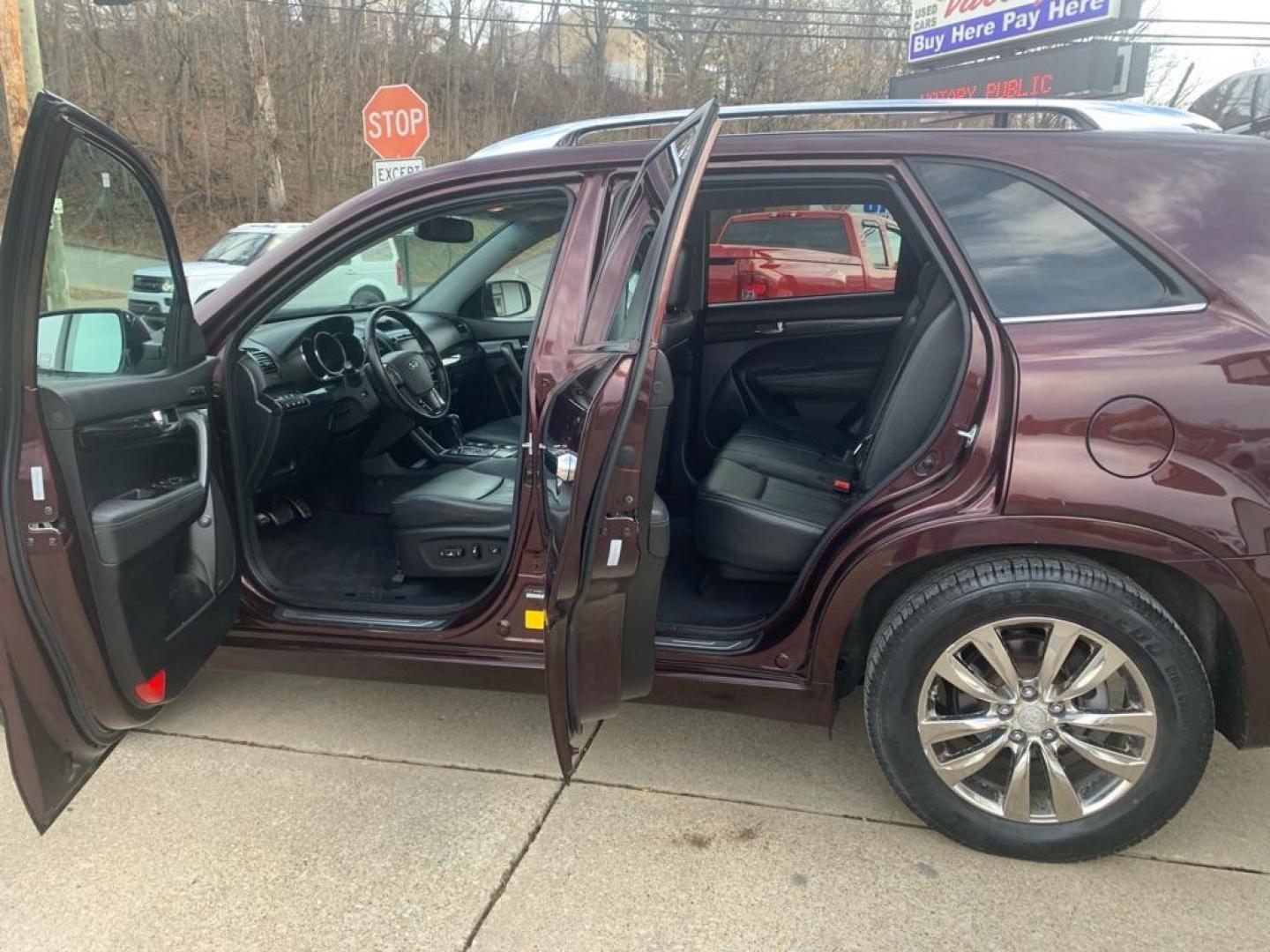 2012 MAROON KIA SORENTO SX (5XYKWDA27CG) with an 3.5L engine, Automatic transmission, located at 503 First Street, Canonsburg, PA, 15317, (724) 745-0566, 40.266006, -80.178413 - Photo#13