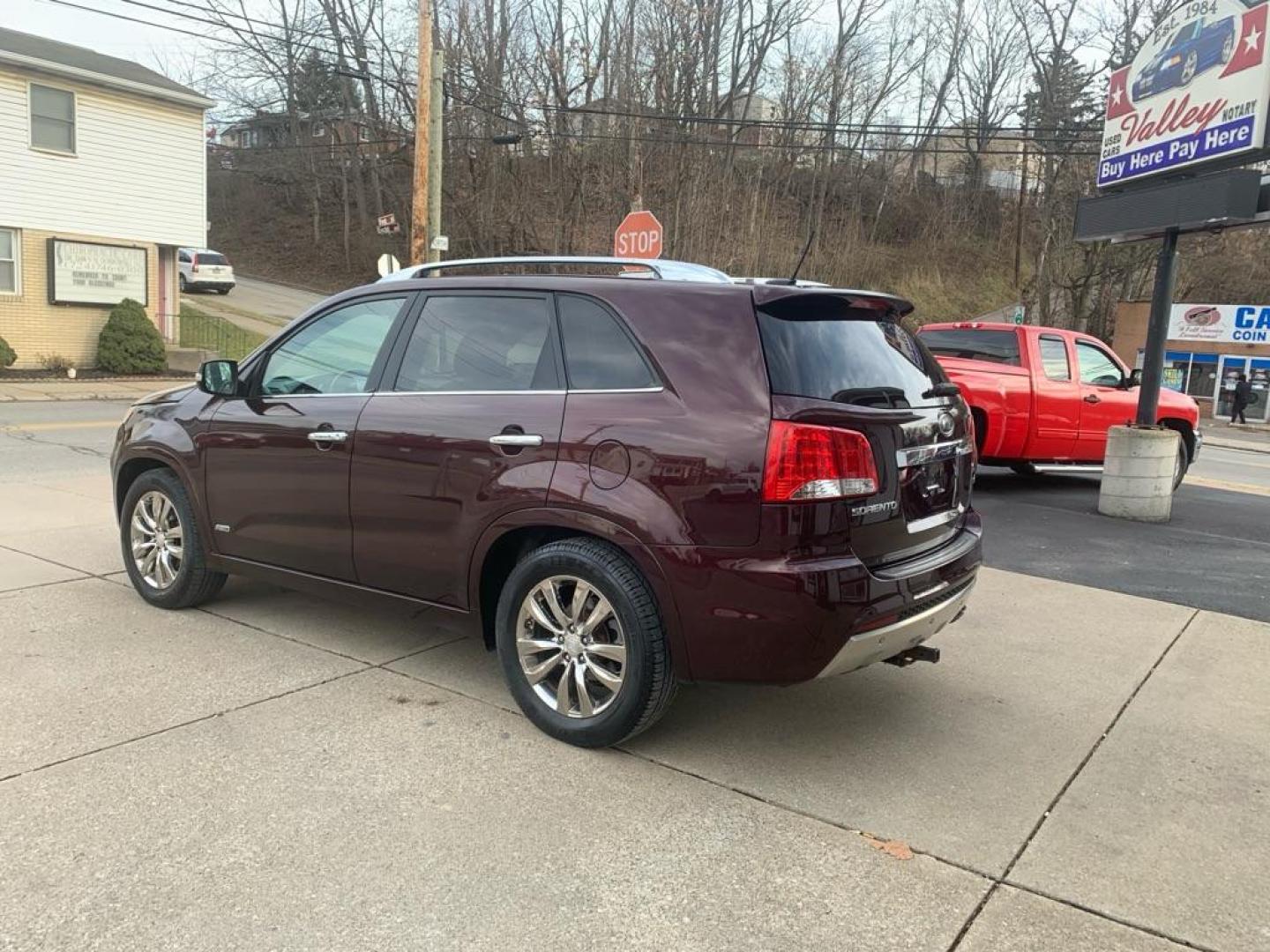 2012 MAROON KIA SORENTO SX (5XYKWDA27CG) with an 3.5L engine, Automatic transmission, located at 503 First Street, Canonsburg, PA, 15317, (724) 745-0566, 40.266006, -80.178413 - Photo#1