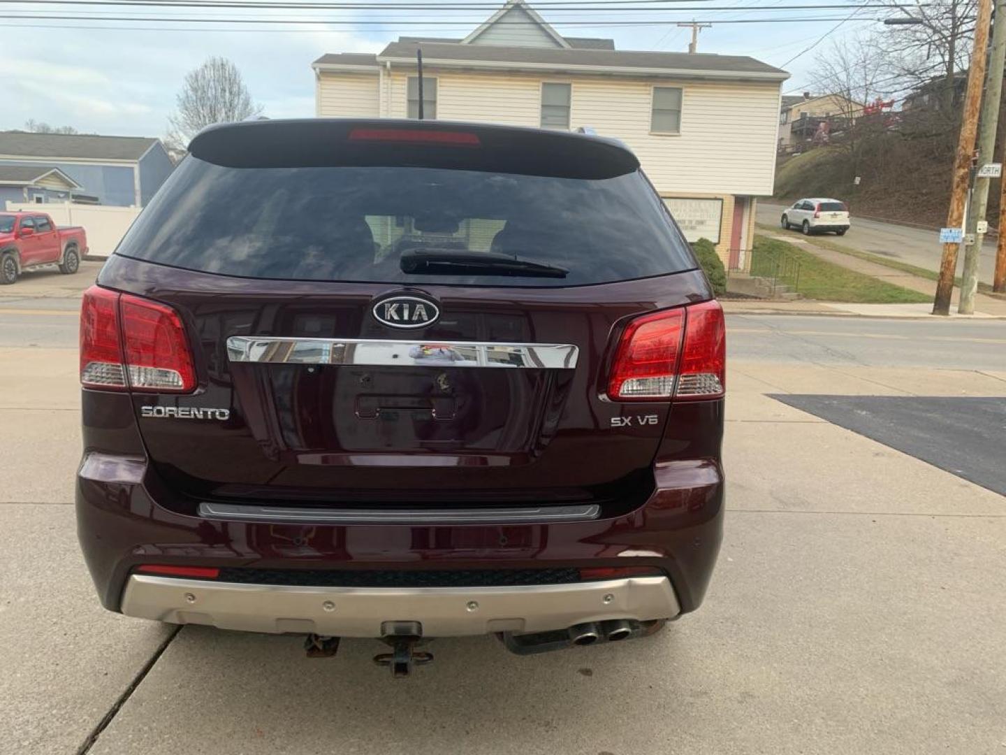 2012 MAROON KIA SORENTO SX (5XYKWDA27CG) with an 3.5L engine, Automatic transmission, located at 503 First Street, Canonsburg, PA, 15317, (724) 745-0566, 40.266006, -80.178413 - Photo#2